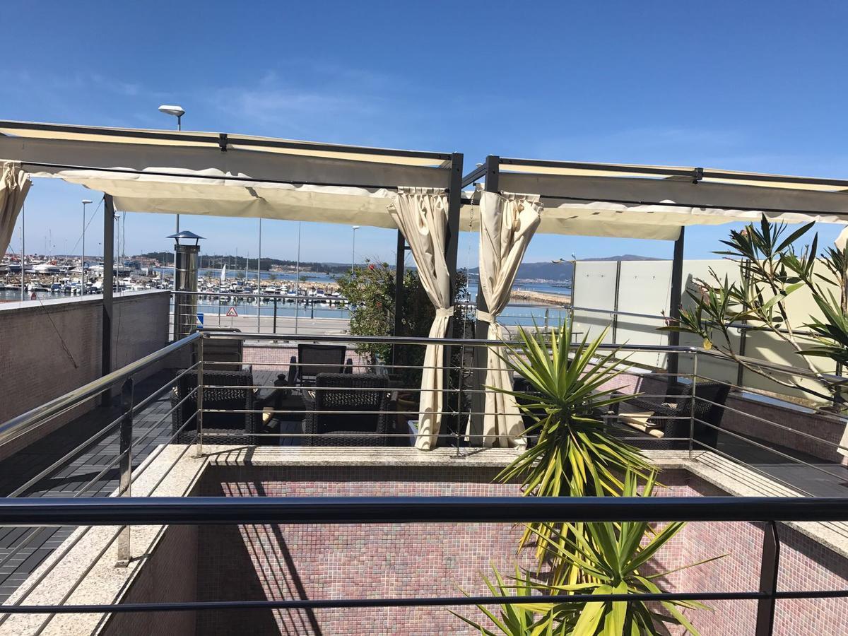 Apartamentos Puerto Basella فيلانويفا دي أروسا المظهر الخارجي الصورة